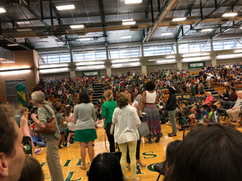 Students and Faculty take their seats as the Founders' Day Assembly begins