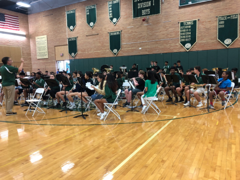 The GH band plays as students enter the gym 