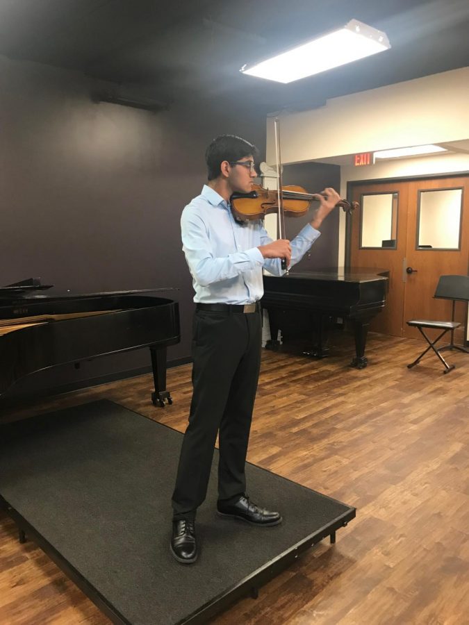 Sophomore Pranav Mukund playing his violin. Photo courtesy of Pranav Mukund.