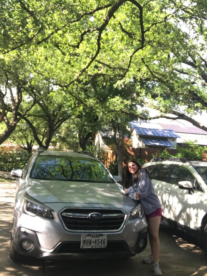 Sophomore Megan Zlotky posing with her car on her birthday.