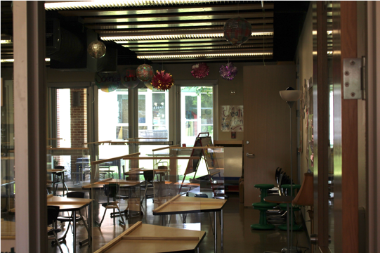 Just as the other classrooms, the rooms in the preschool have plexiglass on top of each desk.