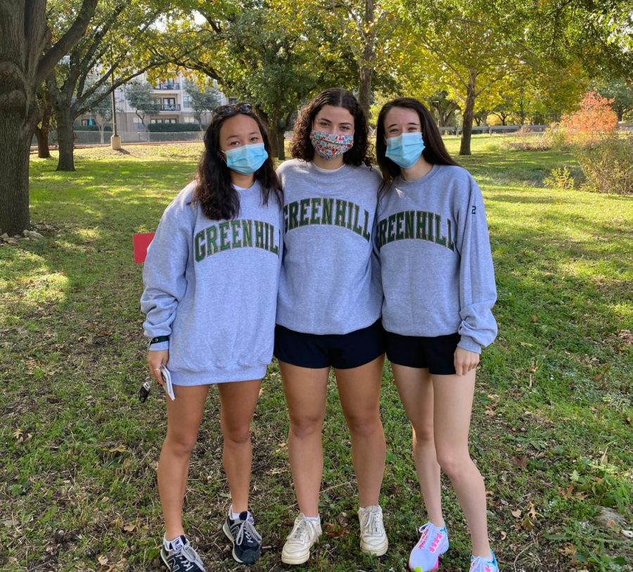 Seniors Olivia Kim, Dulany Bloom, and Jessica Herlitz by the Lower School during the Wildflower Stomp.