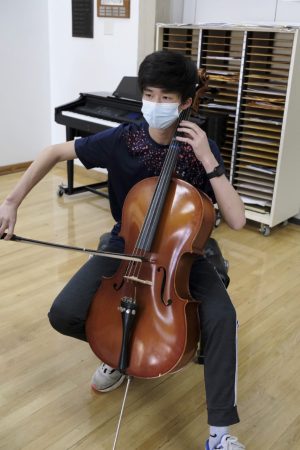 Freshman Aaron Kuang performs Saint-Saens Cello Concerto in A-minor during lunch recital.