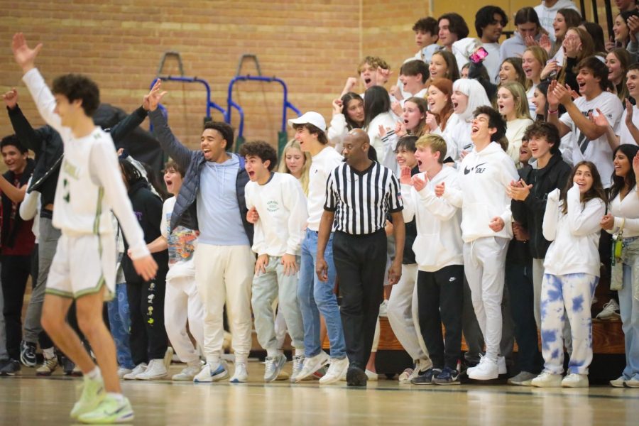 Greenhill+Upper+School+students+cheer+on+the+Boys+Varsity+Basketball+Team+during+the+white+out+game.+