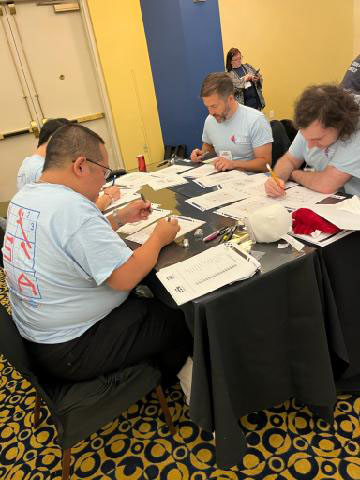 Jason Zuffranieri and his team collaborate to solve a puzzle during the competition. Photo courtesy of Zuffranieri.